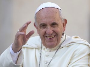 Pope Francis delivers his blessing as he arrives to hold his weekly general audience, in St. Peter's Square, at the Vatican, Wednesday, Sept. 17, 2014. (AP Photo/Andrew Medichini)